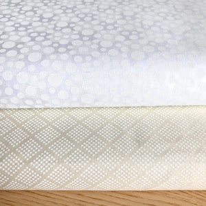 Dotty Grid White on Almond